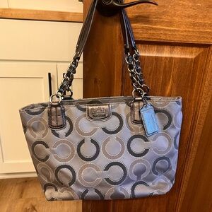 Coach signature tote in gray/silver with silver chain handle detail.